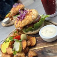 Caesars Burger with potatoesBurger  at Kozy Eats  in Riga