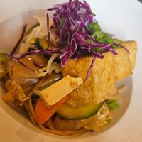 I had vegetable wok with fried tofu and carrot cake for dessert. at Kozy Eats  in Riga