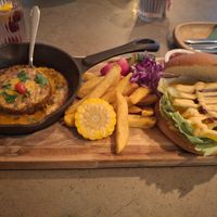 September 2025 - Beyond meat burger, with spicy vegan cheese, french fries, spicy ketchup and homemade pickles at Kozy Eats  in Riga