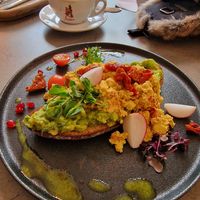 Scrambled egg avocado bread, breakfast before noon. at Kozy Eats  in Riga