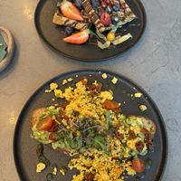 Scramble tofu and guacamole sourdough  and waffles   at Kozy Eats  in Riga