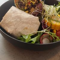 Soup of the day (tomato - bell pepper)

Superfood wrap (quinoa, grille dpepper-tomato tapenade, tofu in orange pepper marinade, salad) (9.9 eur)
 at Kozy Eats  in Riga