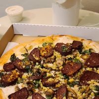 White vegan pepperoni pizza at The King's Feet in Berkeley