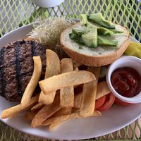 Huge beyond burger patty with a ton of toppings. Fries were good too! Absolutely delicious! at Gloria's Corner Cafe in Moab