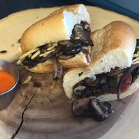 Flambé Mushroom Saltado Baguette Sandwich   at Rocoto Peruvian Kitchen in Portland
