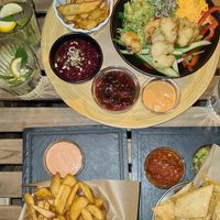 Fries, nachos, Buddha bowl with more fries at Pivstro in Plzen