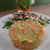 Delicious mango and avocado tartare with a side salad.  at Maison Sukoon in Paris