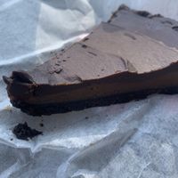 peanut butter chocolate tart 💚  at Tree Hugger Plant-Based Kitchen in Kansas City