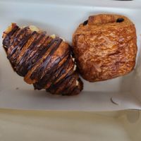 Croissant filled with an orangey cream and a pain au chocolat at Cafe Harepus in Aarhus