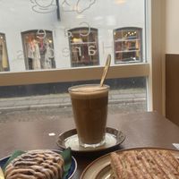 Pumpkin spice latte, focaccia sandwich and cinnamon roll   at Cafe Harepus in Aarhus