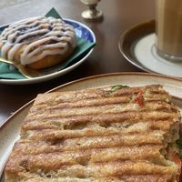 Pumpkin spice latte, focaccia sandwich and cinnamon roll   at Cafe Harepus in Aarhus