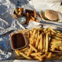 vegan fries with stew sauce and veganaise, burger, vegan mix, vegan 'shrimp',  at Royal Frituur in Bruges