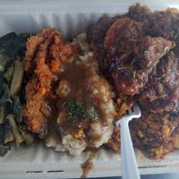 Full heavy plate! Greens, yams, mashed, pumpkin stuffing & jerk jackfruit at Vegan Hood Chefs in San Francisco