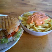 Burger in a bun and fries meal (comes with drink) at Gopal - Vegan Deli in Barcelona