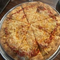 Cheese pizza. You can add toppings if you want.  at District Eat & Play in Oviedo