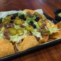 Vegan nachos with guacamole at District Eat & Play in Oviedo