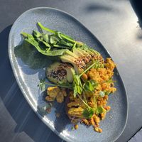 Scrambled tofu, sourdough, avocado, and spinach  at Lilith Coffee in Rotterdam