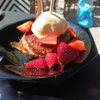 Pancakes with strawberries topping at Lilith Coffee in Rotterdam