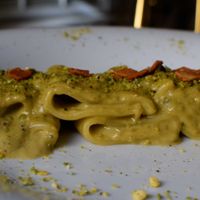 PACCHERI AL PISTACHO DI BRONTE, paccheri with pistachio sauce and vegan bacon at Choose in Madrid