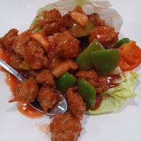 Cerdo agriduce at Happy Veggie Restaurant in New York City