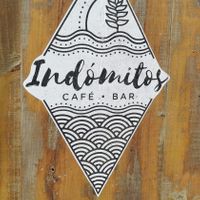 Logo at the entrance at Indómitos Café & Bar in Uvita