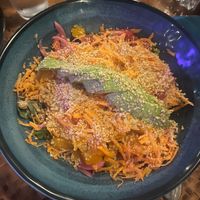 Raw Rainbow Salad with grated walnut on top   at Indómitos Café & Bar in Uvita