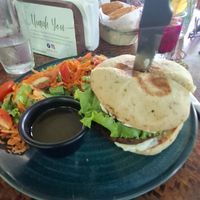 Montana burger with salad at Indómitos Café & Bar in Uvita