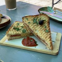 Cheese toastie + salami  at OM NOM NOM CAFÉ in Munich