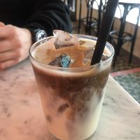Iced latte (hopefully with biodegradable straw)  at OM NOM NOM CAFÉ in Munich