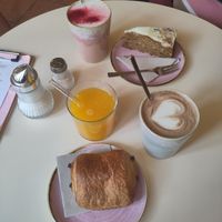 Chai Latte, carrot cake, dirty hot chocolate, pain au chocolat, fresh orange juice at OM NOM NOM CAFÉ in Munich