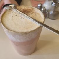 Large cappuccino with hazelnutt sirup (6,-€) at OM NOM NOM CAFÉ in Munich