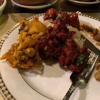 Broccoli 65 and samosa chaat vegan  at The Mango Grove in Columbia