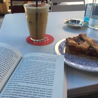 Turmeric Ginger Latte (with plant based milk) and a delicious cake at Joshua Tree Cafe in Athens