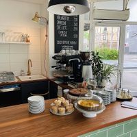 The counter, loaded with cakes and muffins. at NUZ in Linz