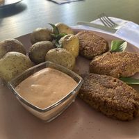 Baked potatoes and soy meat patties  at Veget Vegan in Kharkiv