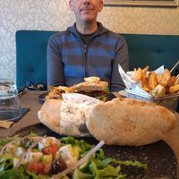 Sheftalia, salad, chips & burger at Elysian Restaurant in Nicosia