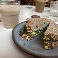 Avocado sandwich and chai latte with almond milkk  at Roots - Maschinenstraße in Zurich