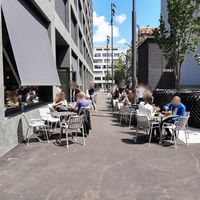 Exterior and outdoor seating at Roots - Maschinenstraße in Zurich
