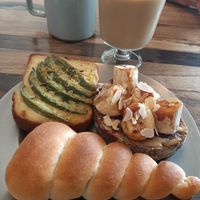 Avo toast, banana caramel toast, and the chelate stuffed pastry (sorry I am ignorant and don't know what it's called) at Universal Bakes and Cafe in Tokyo