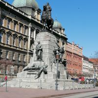 By the statue at Glonojad in Krakow
