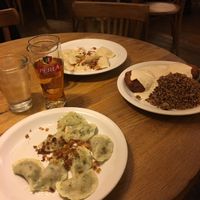 Lentil pierogi, cottage cheese and potato pierogi, vegetable cakes w/ buckweat at Glonojad in Krakow