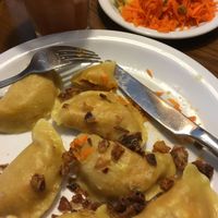 Lentil Pierogi and salads  at Glonojad in Krakow