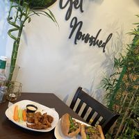 Great ambiance! Vegan bbq wings and “that Philly Jawn” sandwich   at Nourish Philly in Philadelphia