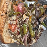 Inside shot of the cheesesteak “that Philly jawn"  at Nourish Philly in Philadelphia