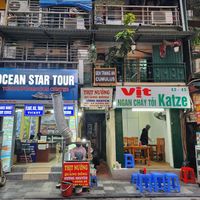 Go through the alleyway and you'll see a sign for restaurant upstairs at Katze Vegan & Vegetarian  in Hanoi