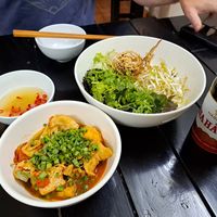 Free tofu & tomato dish, herbs & sprouts, fresh lime juice with chili to dip at Katze Vegan & Vegetarian  in Hanoi