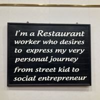 Sign in the restaurant   at Katze Vegan & Vegetarian  in Hanoi