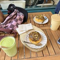 Pistachio bun vegan! And matcha almond milk. All the white labels are vegan pastries - amazing   at Cassonade Cannelés & Spécialités in Bordeaux