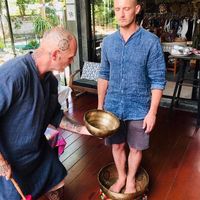 Demonstrating sound bowls at Jungala in Phuket