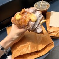 custard croissant and an iced americano 🥰  at Tart Bakery - Queen St in Auckland